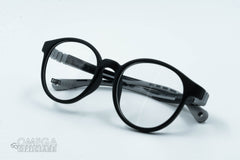 Round, matte black frame
